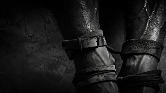 rev______A_close-up_photograph_of_a_mans_ankles_bound_with_a__826e6847-1124-4646-b8d4-e09daec5effc_0.png